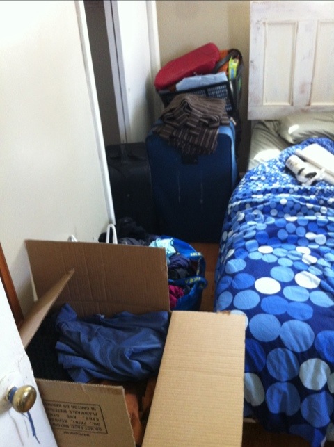 My closet, emptied into suitcases My closet, emptied into suitcases